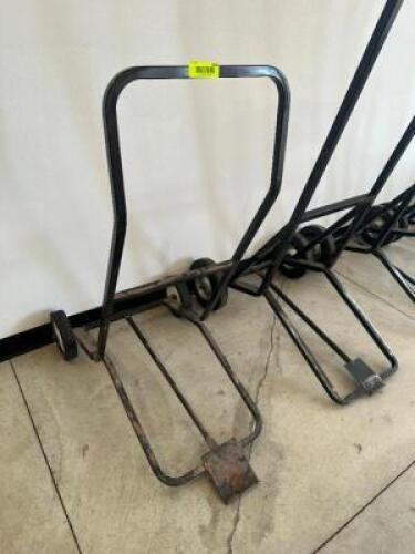 DESCRIPTION STACK CHAIR DOLLY ADDITIONAL INFORMATION IF YOU NEED A DOLLY TO MOVE YOUR CHAIRS IT IS RECOMMEND TO BUY ONE AT AUCTION. WE CANNOT LOAN THE