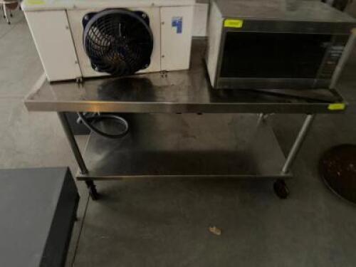 DESCRIPTION 60" STAINLESS TABLE ON CASTERS ADDITIONAL INFORMATION CONTENTS ARE NOT INCLUDED LOCATION SECOND BUILDING QTY 1