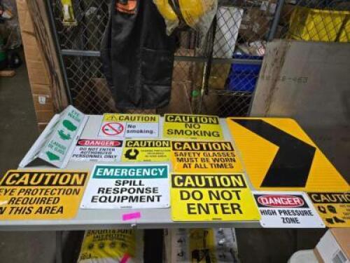 DESCRIPTION: (1) TABLE OF MISC SIGNS BRAND/MODEL: MANY INFORMATION: MUST COME INSPECT QTY: 1
