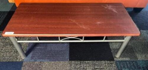 (2) 45" X 21" CHERRY LAMINATE WOOD COFFEE TABLES.