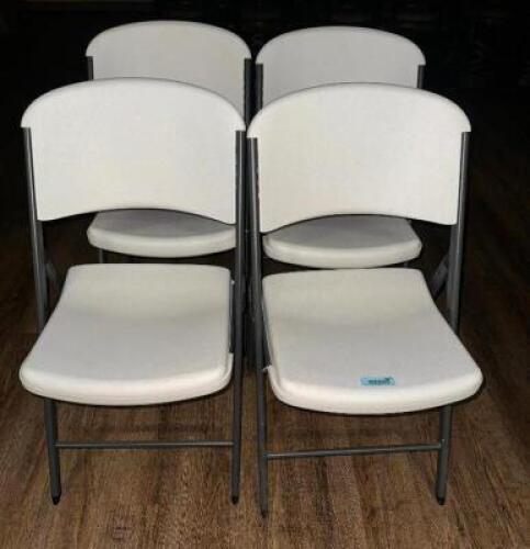 (4) WHITE PLASTIC FOLDING CHAIRS