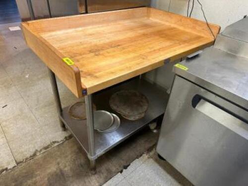 DESCRIPTION 48" X 30" BUTCHER BLOCK TABLE W/ BACK AND SIDE SPLASH BRAND / MODEL: JOHN BOOS SIZE 48" X 30" LOCATION KITCHEN QTY 1