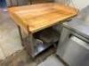 DESCRIPTION 48" X 30" BUTCHER BLOCK TABLE W/ BACK AND SIDE SPLASH BRAND / MODEL: JOHN BOOS SIZE 48" X 30" LOCATION KITCHEN QTY 1