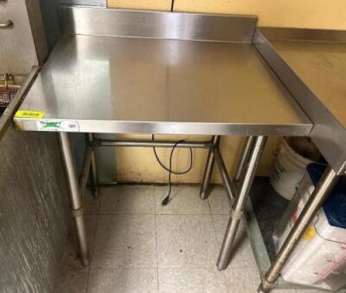 DESCRIPTION 30" X 24" STAINLESS TABLE W/ BACK SPLASH BRAND / MODEL: REGENCY S00WT24X30BS SIZE 30" X 24" LOCATION KITCHEN QTY 1