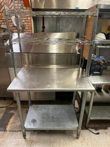 DESCRIPTION 36" X 30" STAINLESS TABLE W/ TWO TIER WIRE RISER SHELF. LOCATION KITCHEN QTY 1