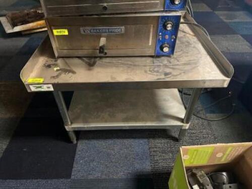 DESCRIPTION 36" X 30" STAINLESS LOW BOY EQUIPMENT STAND W/ 2" SURROUND SPLASH ADDITIONAL INFORMATION CONTENTS ARE NOT INCLUDED LOCATION MAIN SEATING Q