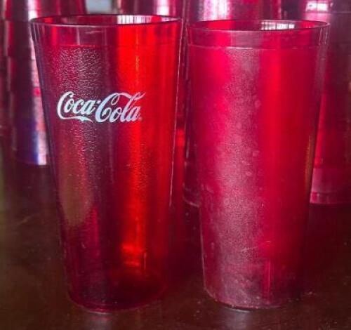 DESCRIPTION: (20) - PLASTIC DRINKING CUPS ADDITIONAL INFORMATION: MIXED BRANDING. SOME HAVE COCA COLA BRANDING AND OTHERS ARE BLANK. LOCATION: TABLES
