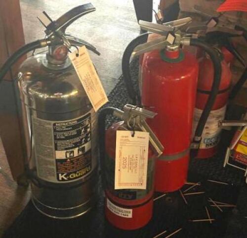 DESCRIPTION: ASSORTED FIRE EXTINGUISHERS AND HARDWARE LOCATION: TABLES THIS LOT IS: ONE MONEY QTY: 1