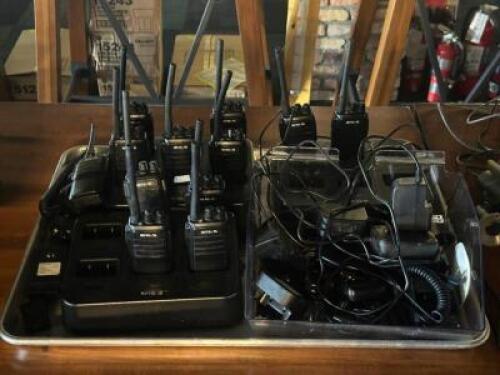 DESCRIPTION: LARGE GROUP OF WALKIE TALKIE WITH CHARGER STATION LOCATION: TABLES THIS LOT IS: ONE MONEY QTY: 1