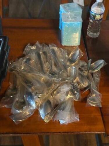 DESCRIPTION: LARGE ASSORTMENT OF FLATWARE LOCATION: TABLES THIS LOT IS: ONE MONEY QTY: 1