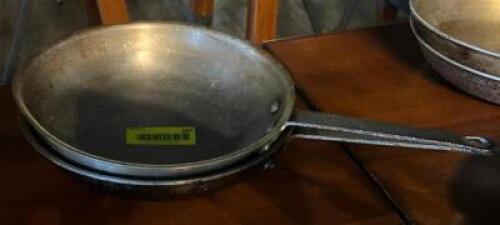 DESCRIPTION: (2) - FRYING PANS LOCATION: TABLES THIS LOT IS: SOLD BY THE PIECE QTY: 2