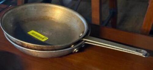 DESCRIPTION: (2) - FRYING PANS LOCATION: TABLES THIS LOT IS: SOLD BY THE PIECE QTY: 2