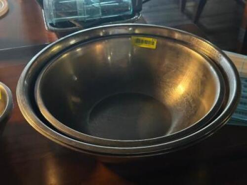 DESCRIPTION: (4) - LARGE STAINLESS MIXING BOWLS LOCATION: TABLES THIS LOT IS: SOLD BY THE PIECE QTY: 4