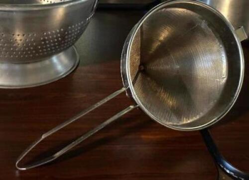 DESCRIPTION: STAINLESS CAP STRAINER LOCATION: TABLES THIS LOT IS: ONE MONEY QTY: 1