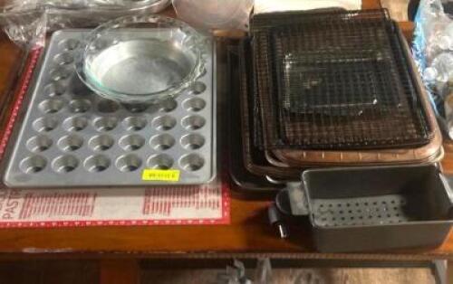DESCRIPTION: ASSORTED BAKING TRAYS AND RACKS LOCATION: TABLES THIS LOT IS: ONE MONEY QTY: 1