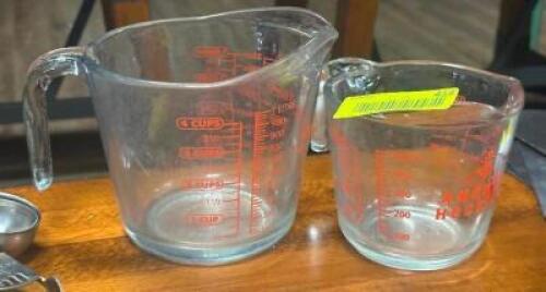 DESCRIPTION: (2) - MEASURING CUPS LOCATION: TABLES THIS LOT IS: SOLD BY THE PIECE QTY: 2