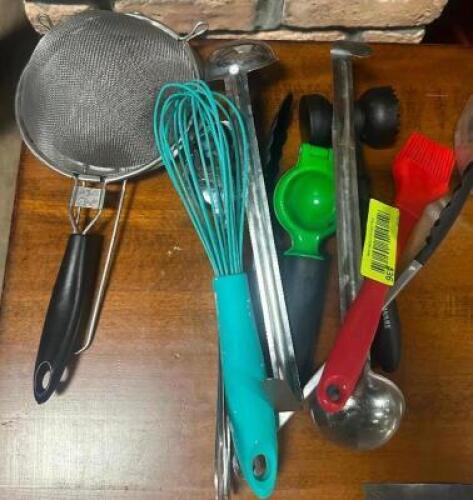 DESCRIPTION: ASSORTED UTENSILS LOCATION: TABLES THIS LOT IS: ONE MONEY QTY: 1