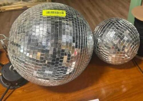 DESCRIPTION: (2) - DISCO BALLS WITH ROPE LOCATION: TABLES THIS LOT IS: ONE MONEY QTY: 1