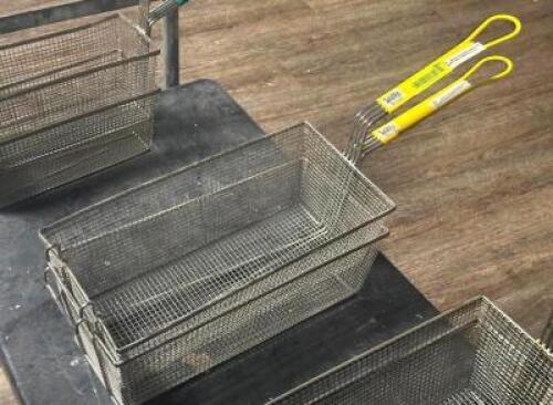 DESCRIPTION: (2) - FRYER BASKETS LOCATION: TABLES THIS LOT IS: SOLD BY THE PIECE QTY: 2