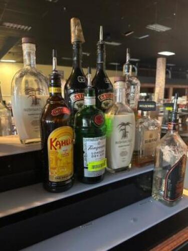 DESCRIPTION (1) LOT OF ASSORTED OPEN BOTTLES OF MIXERS AND SPIRITS. THIS LOT IS: ONE MONEY LOCATION BAR QTY 1