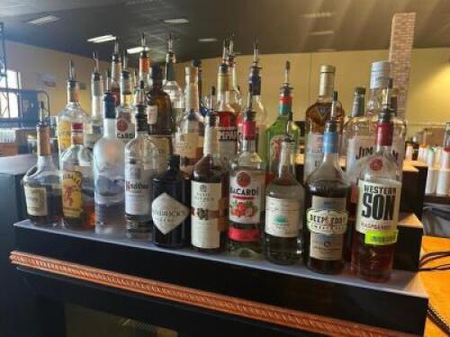 DESCRIPTION (1) LOT OF ASSORTED OPEN BOTTLES OF MIXERS AND SPIRITS. THIS LOT IS: ONE MONEY LOCATION BAR QTY 1