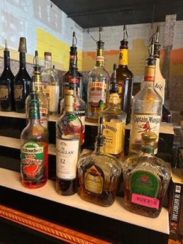 DESCRIPTION (1) LOT OF ASSORTED OPEN BOTTLES OF MIXERS AND SPIRITS. THIS LOT IS: ONE MONEY LOCATION BAR QTY 1