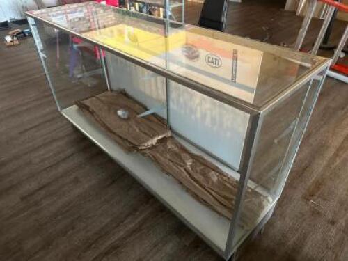 DESCRIPTION (2) 70" GLASS SHOWCASES. THIS LOT IS: SOLD BY THE PIECE SIZE 70" LOCATION WAREHOUSE QTY 2