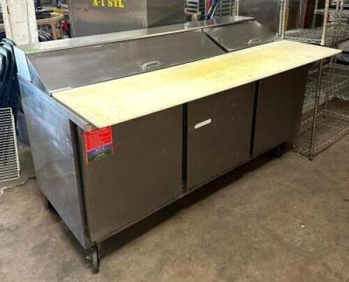 DESCRIPTION: 72" 3-DOOR REFRIGERATED SANDWICH PREP TABLE BRAND/MODEL: BEVERAGE-AIR SPE72-18C INFORMATION: TURNS ON, BUT DOES NOT COOL LOCATION: BAY 6