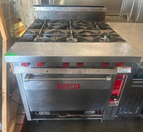DESCRIPTION VULCAN SIX BURNER RANGE W/ CONVENTIONAL OVEN BRAND / MODEL: VULCAN ADDITIONAL INFORMATION NATURAL GAS. MISSING KICK PLATE LOCATION BAY 6 Q