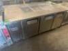 DESCRIPTION TORRISON THREE DOOR OPEN TOP PREP TABLE. BRAND / MODEL: TORRISON ADDITIONAL INFORMATION 115 VOLT, 1 PHASE. TESTED AND COOLING. LOCATION BA