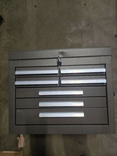 DESCRIPTION: (1) TOOL STORAGE BOXBRAND/MODEL: KENNEDYINFORMATION: 7 DRAWERS, BROWN, LOCKING, SMALL DENT IN LIDSIZE: APPROX 20" X 8 1/2" X 16 1/2"RETAIL$: $537.00 EAQTY: 1