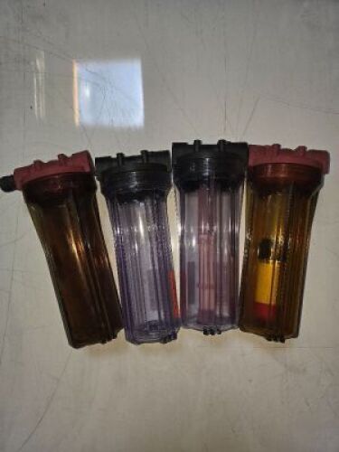 DESCRIPTION: (4) WATER FILTER HOUSINGS RETAIL$: $49.95/EA SIZE: FOR 2 1/2" X 10" FILTERS QTY: 4