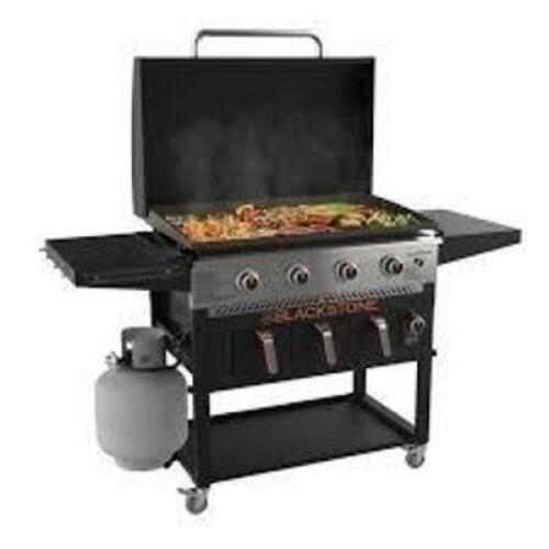 DESCRIPTION: (1) PROPANE GAS GRILL GRIDDLE / AIR FRYER COOKING STATION BRAND/MODEL: BLACKSTONE #1863 INFORMATION: BLACK SIZE: 36", 4 BURNER RETAIL$: $