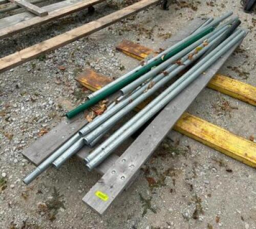 (6) - FENCE POSTS ON ROLLING CART