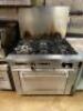 DESCRIPTION SUNFIRE SIX BURNER GAS RANGE W/ LOWER CONVENTIONAL OVEN BRAND / MODEL: SUNFIRE ADDITIONAL INFORMATION NATURAL GAS. WAS ON AND AT FULL TEMP