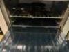 DESCRIPTION SUNFIRE SIX BURNER GAS RANGE W/ LOWER CONVENTIONAL OVEN BRAND / MODEL: SUNFIRE ADDITIONAL INFORMATION NATURAL GAS. WAS ON AND AT FULL TEMP - 3