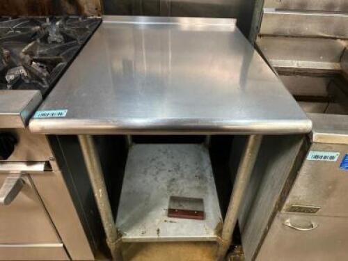 DESCRIPTION 30" X 24" STAINLESS TABLE W/ 1" BACK SPLASH ADDITIONAL INFORMATION HEAVY DUTY STAINLESS W/ GALVANIZED LOWER SHELF. LOCATION KITCHEN QTY 1