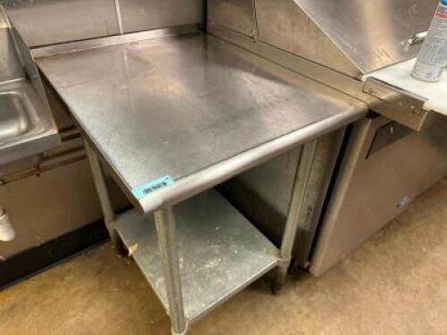 DESCRIPTION 30" X 24" STAINLESS TABLE W/ 1" BACK SPLASH ADDITIONAL INFORMATION HEAVY DUTY STAINLESS W/ GALVANIZED LOWER SHELF. LOCATION KITCHEN QTY 1