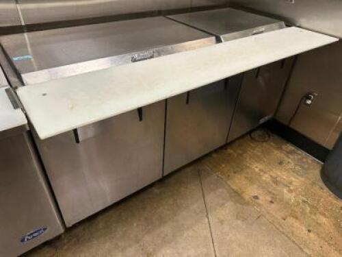 DESCRIPTION TRUE 72" THREE DOOR MEGA TOP SANDWICH PREP TABLE. BRAND / MODEL: TRUE TSSU-72-30MM-8-27 ADDITIONAL INFORMATION SN# 8927139, 115 VOLT, 1 PH