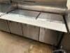 DESCRIPTION TRUE 72" THREE DOOR MEGA TOP SANDWICH PREP TABLE. BRAND / MODEL: TRUE TSSU-72-30MM-8-27 ADDITIONAL INFORMATION SN# 8927139, 115 VOLT, 1 PH - 2