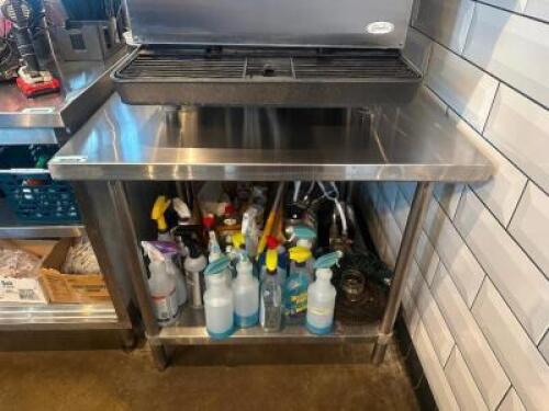 DESCRIPTION 36 "X 30" HEAVY DUTY STAINLESS TABLE W/ 4" BACK SPLASH SIZE 36 "X 30" LOCATION ENTRANCE QTY 1