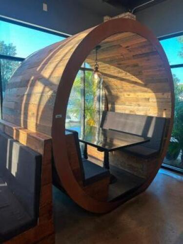 DESCRIPTION CIRCULAR WOOD BOOTH WITH UPHOLSTERED PADDED SEATING AND CENTER TABLE/ COMES WITH PENDANT LIGHT FIXTURE. ADDITIONAL INFORMATION UNIQUE CIRC