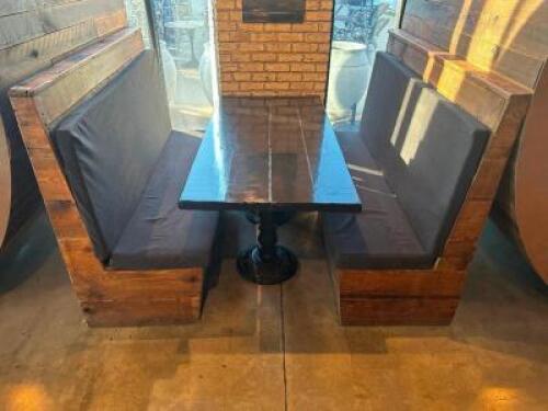 DESCRIPTION 66" X 40" HARDWOOD TABLE W/ DOUBLE PEDESTAL CAST IRON BASES AND (2) WOODEN BENCH SEATS W/ UPHOLSTERED PADS. THIS LOT IS: ONE MONEY LOCATIO