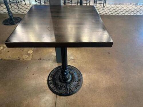 DESCRIPTION 30" X 30" HARDWOOD TABLE W/ CAST IRON PUB BASE. SIZE 30" X 30" X 42" T LOCATION BAR QTY 1
