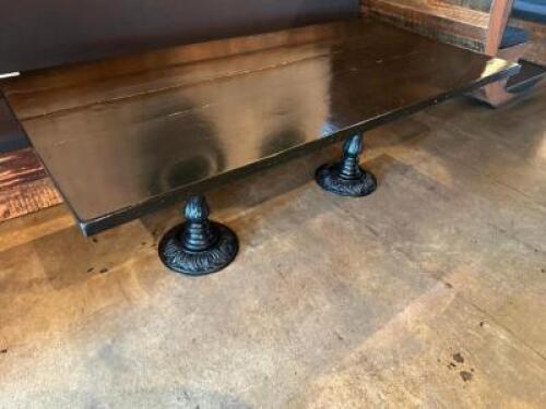 DESCRIPTION 84" X 40" HARDWOOD TABLE W/ DOUBLE PEDESTAL CAST IRON BASES. SIZE 84" X 30" LOCATION MAIN SEATING QTY 1