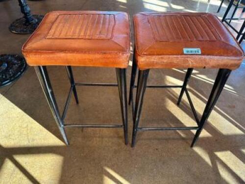 DESCRIPTION (2) 18" X 18" COGNAC LEATHER BACKLESS BAR STOOLS. ADDITIONAL INFORMATION IN GOOD CONDITION. NORMAL WEAR ON 2 YEAR OLD LEATHER SEATS. THIS