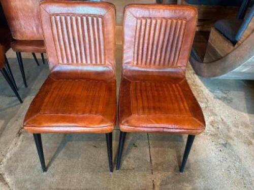 DESCRIPTION (4) COGNAC LEATHER DINING CHAIRS ADDITIONAL INFORMATION IN GOOD CONDITION. NORMAL WEAR ON 2 YEAR OLD LEATHER SEATS. THIS LOT IS: SOLD BY T