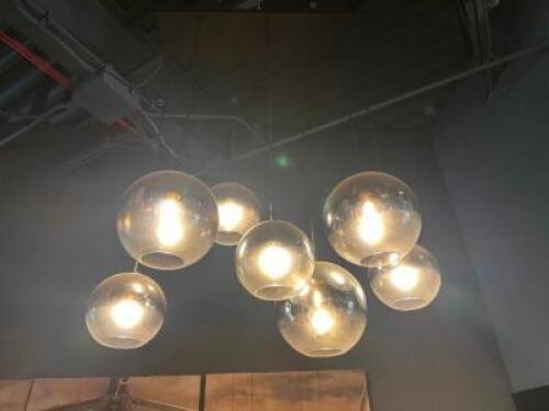 DESCRIPTION MODERN NORDIC GLASS SEVEN GLOBE LIGHT FIXTURE. ADDITIONAL INFORMATION WINNING BIDDER MUST WIRE CAP AFTER REMOVAL OR BE CHARGED $50 FOR BCL