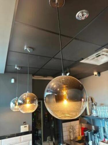 DESCRIPTION MODERN NORDIC (3) PENDANT LIGHTS GLOBES ADDITIONAL INFORMATION WINNING BIDDER MUST WIRE CAP AFTER REMOVAL OR BE CHARGED $50 FOR BCL TO CAP