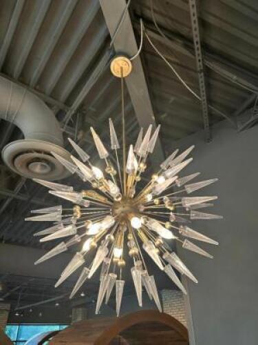 DESCRIPTION POSSINI EURO JANAE 29 1/2" WIDE ANTIQUE GOLD STARBURST PENDANT LIGHT. RETAILS FOR $700 ADDITIONAL INFORMATION WINNING BIDDER MUST WIRE CAP